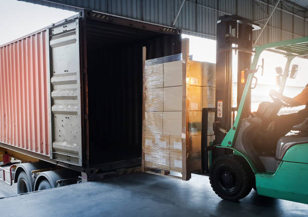 istockphoto-1336433544-612×612 Forklift Loading Package